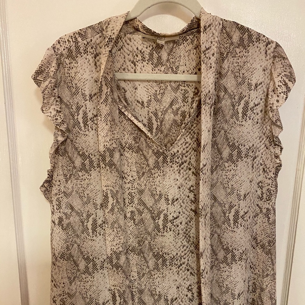 Loft cap sleeve tie neck blouse.